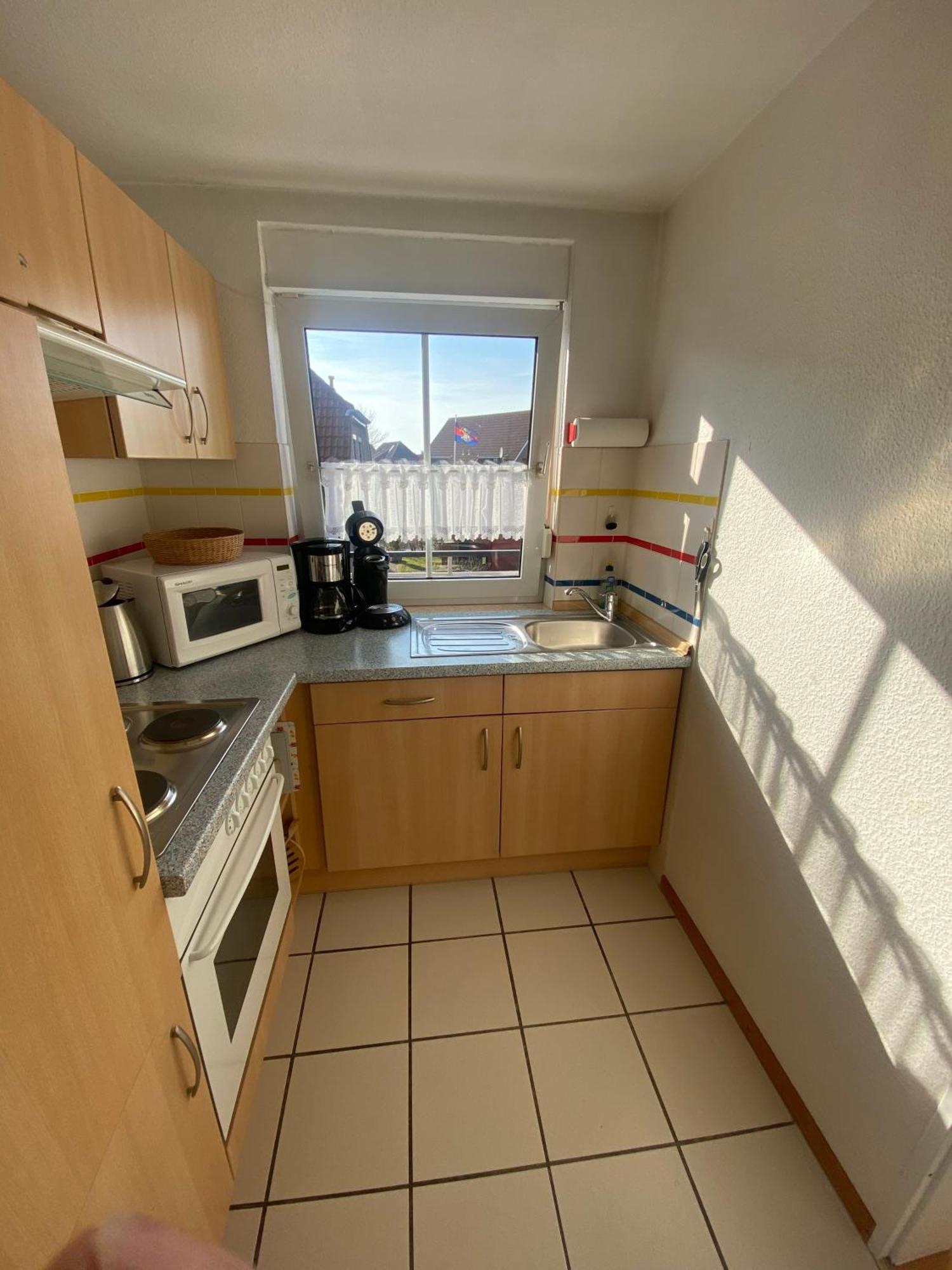 Leybuchthus Apartment Greetsiel Bagian luar foto